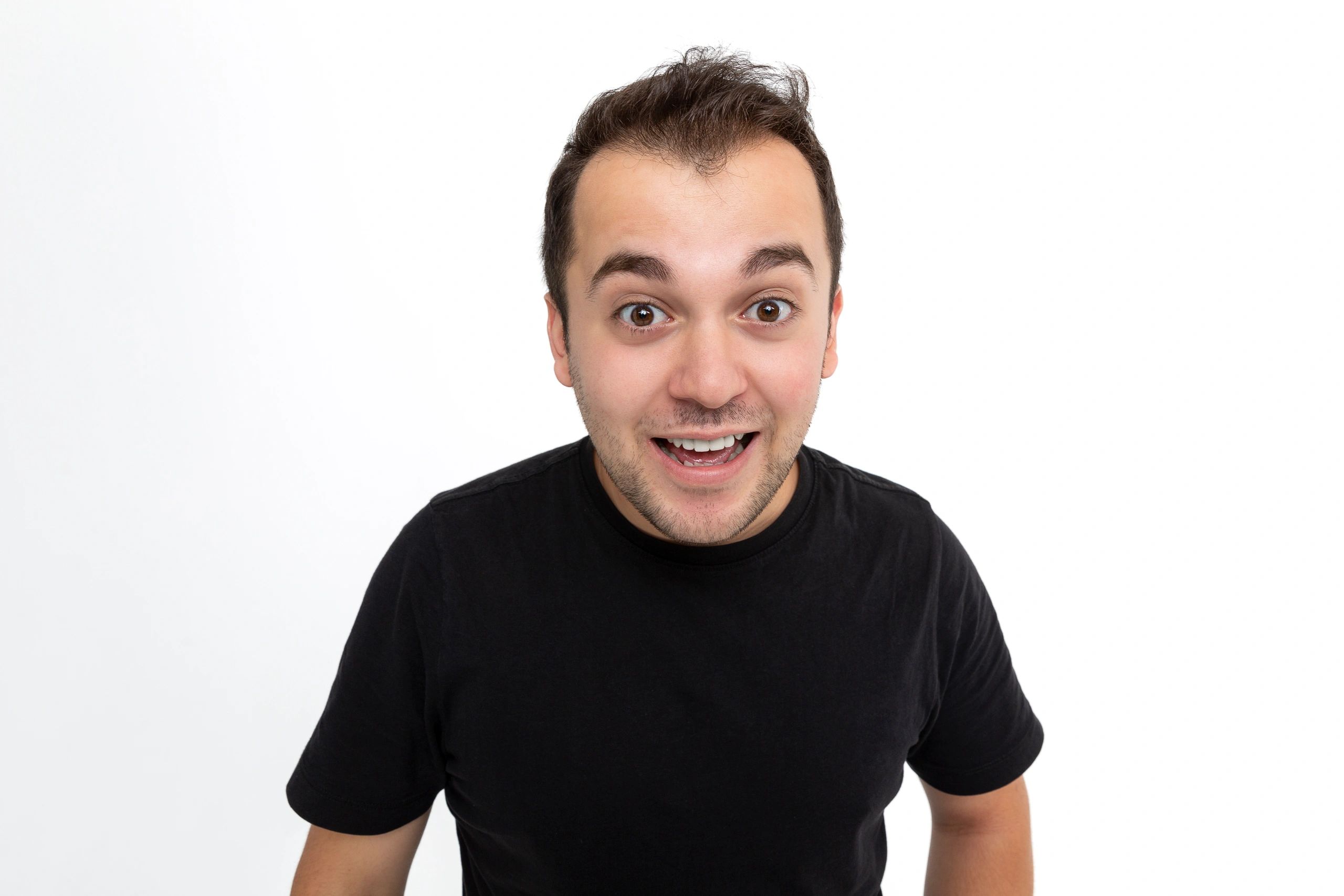 Smiling patient representing confident orthodontic retainer results