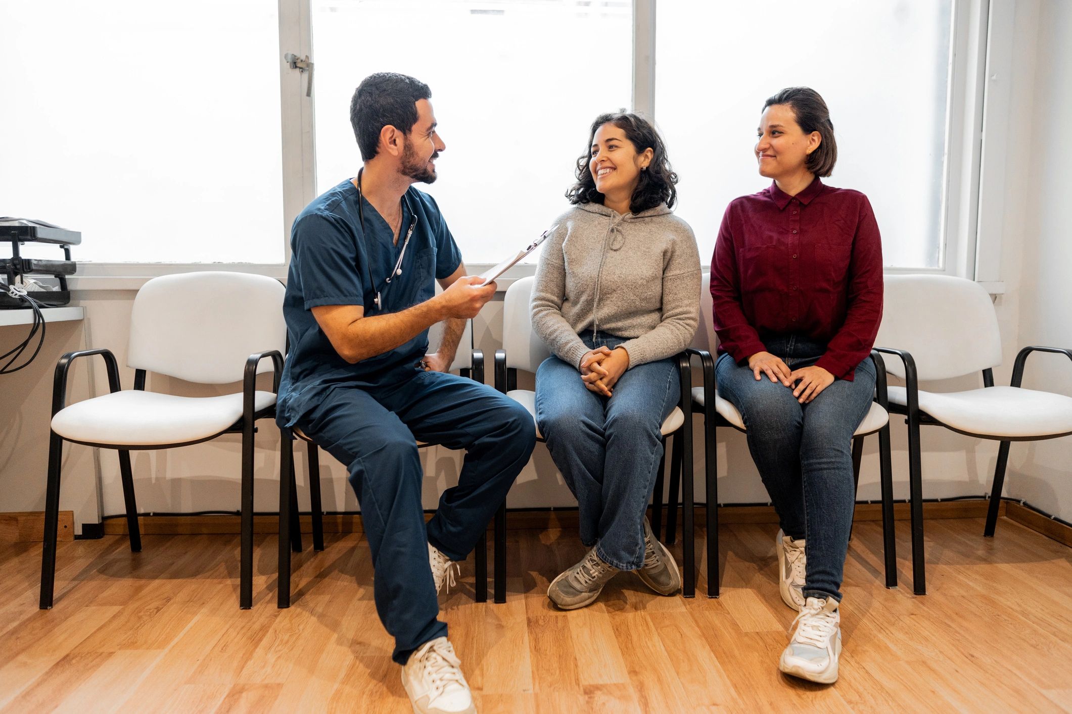 Orthodontic consultation with a family in a welcoming clinical setting