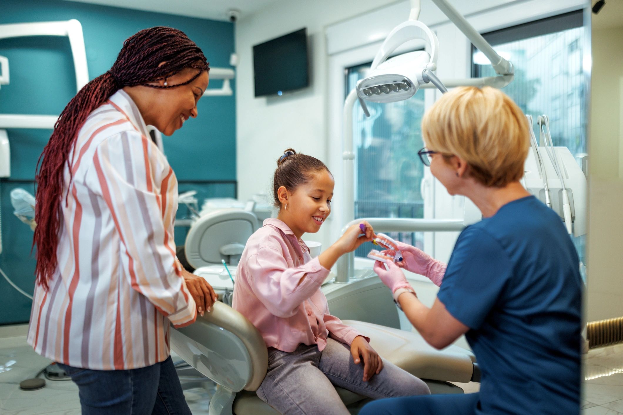 Pediatric dental education with child and parent in a family-friendly office